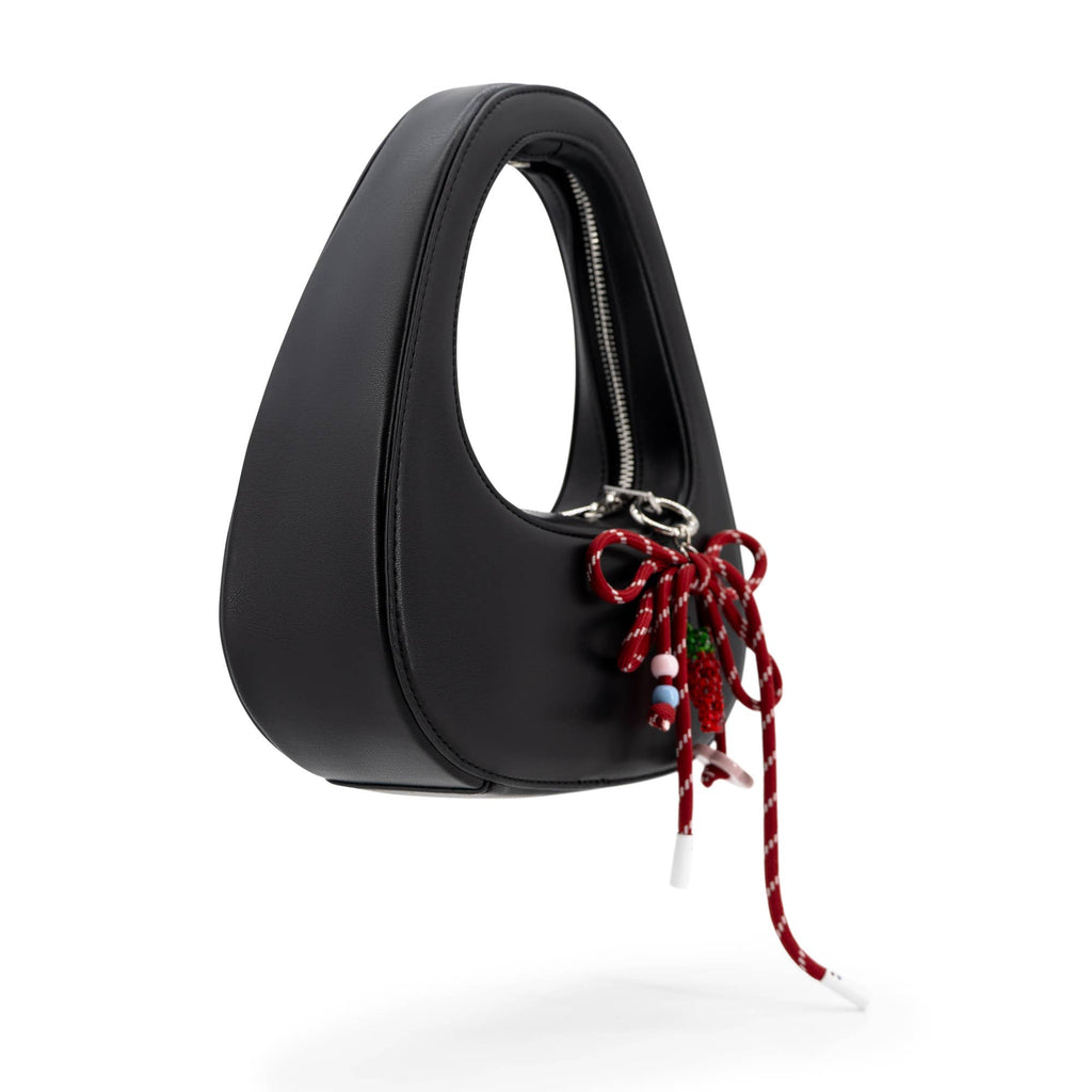The Halo Bow Vegan Leather Charmed Clutch Bag